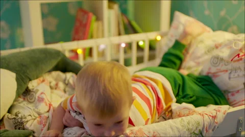 Little boy lying in bed before going to sleep Stock Footage 62730464