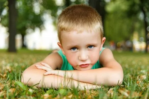 Little boy lying Stock Photos