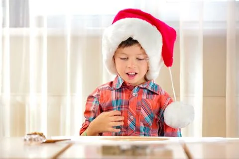 Little boy making preparations for baking cookies Stock Photos