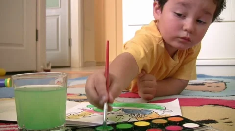 Little boy painting Stock Footage