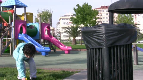 Little boy Picking Up Litter Stock Footage 22699320