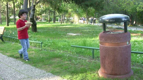 Little boy Picking Up Litter Stock Footage 22958795