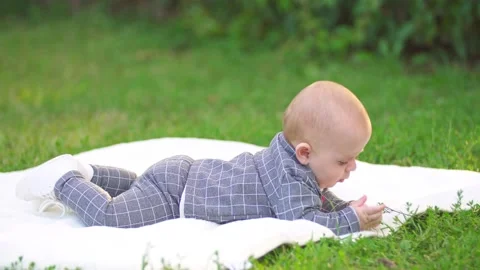 Little boy on a plaid Stock Footage 140994146
