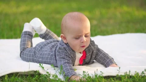 Little boy on a plaid Stock-Footage 141171087