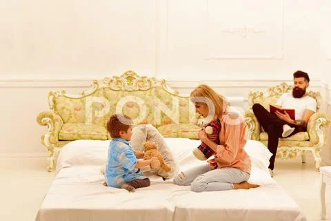 Little boy play with parents at home. happy childhood. Care and development Stock Photos
