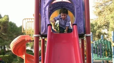 Little boy in playground Stock Footage 12329651