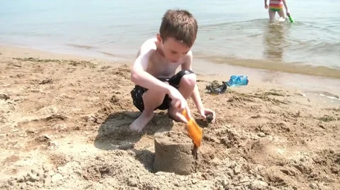Little Boy Playing at the Beach Video stock 66064002