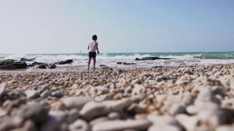 Little boy playing on the beach 스톡 동영상 208048228