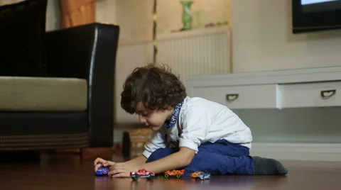 Little boy is Playing with car Stock Footage 44340375