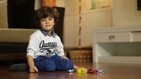Little boy is Playing with car Stock Footage 44393129