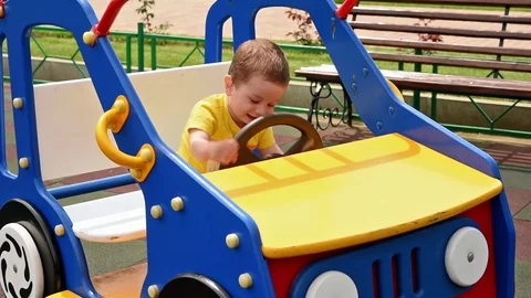 Little boy playing in the car Stock Footage 75836670