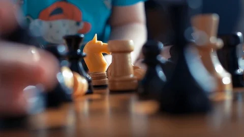 Little boy playing chess Stock Footage 89063949