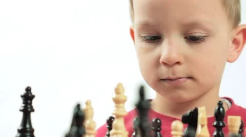 Little boy playing chess. Small genius. Stock Footage 8869224