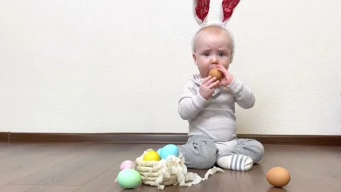 Little boy playing with colorful Easter eggs. Stock Footage 172538844