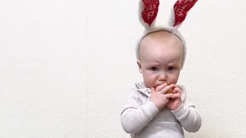 Little boy playing with colorful Easter egg Stock Footage 174807550