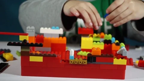 Little boy playing with constructor  Stock Footage 82491155