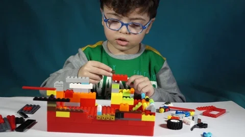 Little boy playing with constructor  Stock Footage 82491458