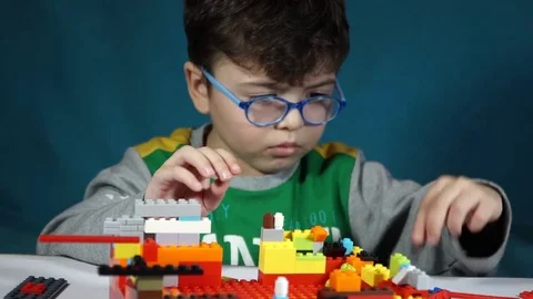 Little boy playing with constructor  Stock Footage 82491486