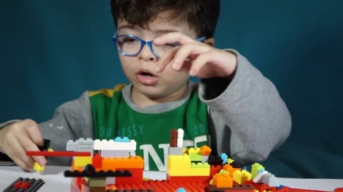 Little boy playing with constructor  Stock Footage 82491561