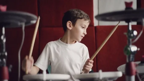 Little boy playing electronic drums Stock Footage 77163741
