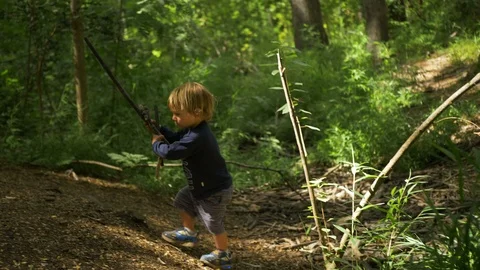 Little Boy Playing on the Forest Stock Footage 106106301