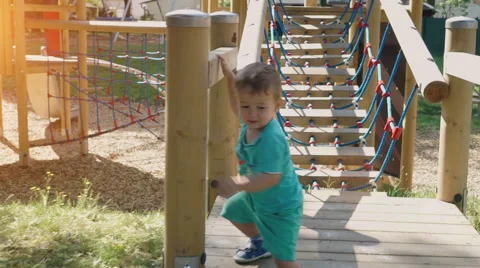 Little Boy Playing on Playground Stock Footage 52383968