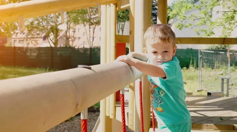 Little Boy Playing on Playground Vídeo Stock 52385015