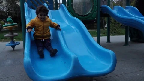 Little boy is playing on the playground Stock Footage 82484672