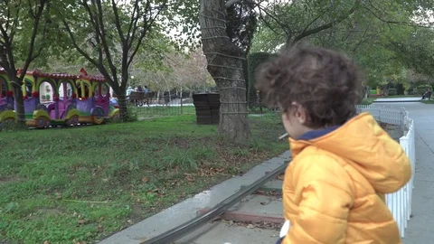 Little boy is playing on the playground Stock Footage 82484838