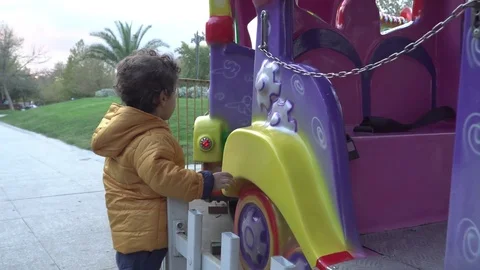 Little boy is playing on the playground Stock Footage 82484906
