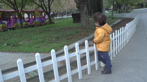 Little boy is playing on the playground Stock Footage 82484924