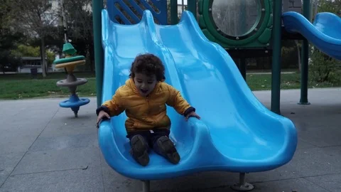 Little boy is playing on the playground Stock Footage 82485023