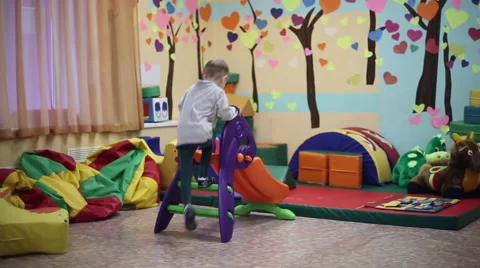 Little boy playing in the playroom Video stock 61535855