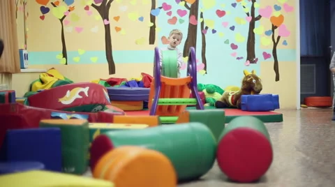 Little boy playing in the playroom Stock Footage 61535954