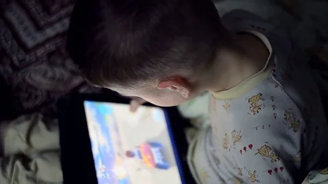 Little boy playing on the tablet computer games Stock Footage 73695860