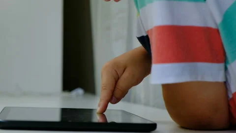 Little boy Playing with Tablet Stock Footage 94955756