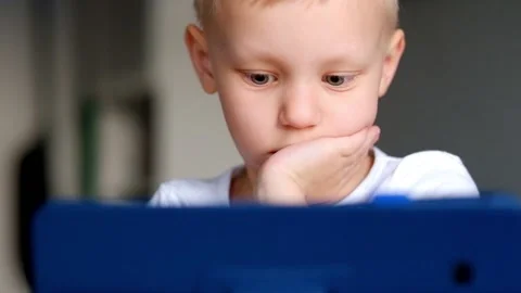 Little boy Playing with Tablet PC Video stock 90370077