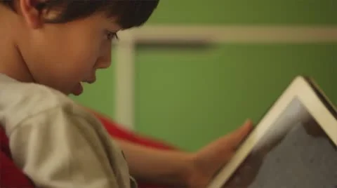 Little Boy playing with Tablet profile Vidéo 67952355