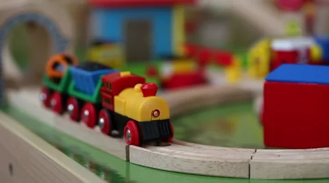 A little boy playing with a toy train Stock Footage 45949147