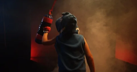 Little boy practice boxing on punching bag Stock Footage 112121448