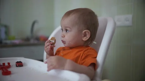Little boy practices eating in the kitchen 23  - Without color correction Stock-Footage 55111099