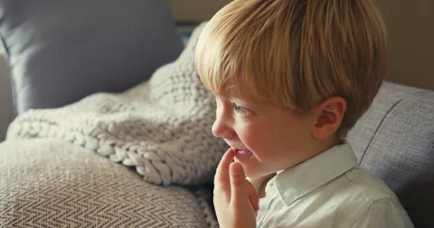 Little boy pulling out his first loose tooth Stock-Footage 346982957