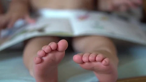 Little boy reading a book  Stock Footage 80237999
