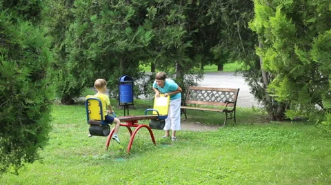 Little boy riding seesaw Stock Footage 52430992