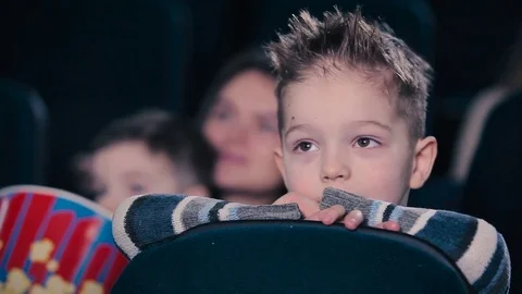 The little boy screamin in the cinema Stock Footage