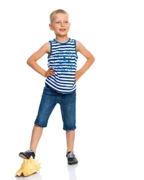 A little boy with a sea shell. Stock Photos