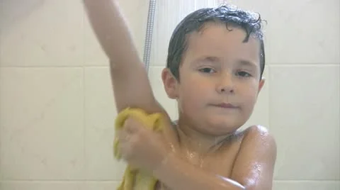 Little boy in shower Stock Footage 11768700