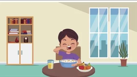 Little boy sitting at table eating healthy breakfast cereal in bright dinin.. Stock Footage 339049383