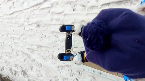 Little boy sledding in the snow. Video stock 226730994
