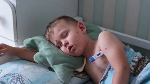 Little boy sleeping and measuring temperature Stock Footage 200760624
